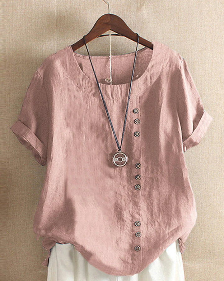 Blusa donna girocollo maniche corte risvoltate abbottonatura asimmetrica vestibilità ampia