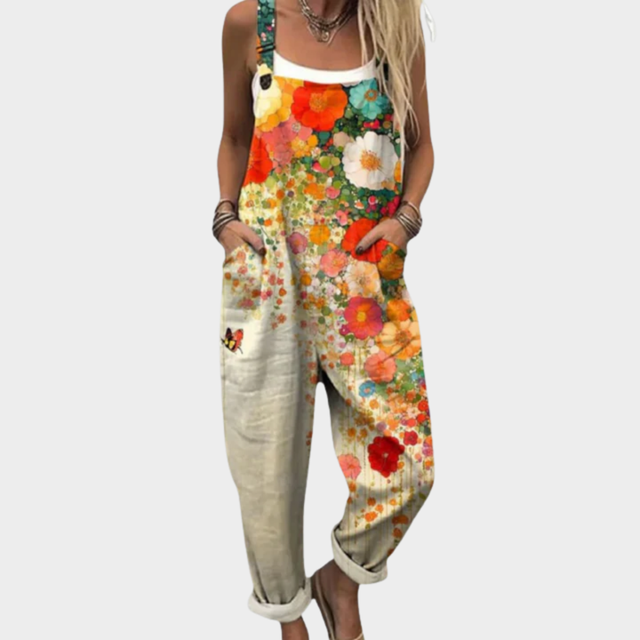Tuta da donna lunga e ampia con motivo floreale multicolore e spalline sottili
