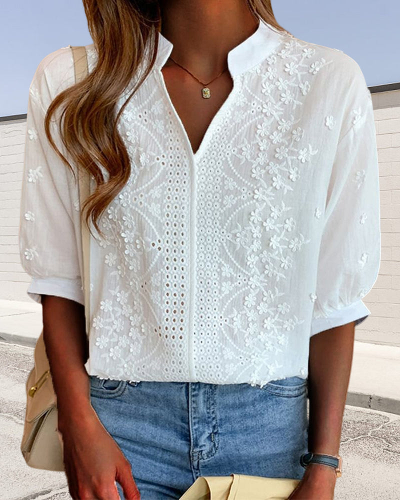 Blusa da donna bianca scollo a V maniche a sbuffo dettagli ricamati