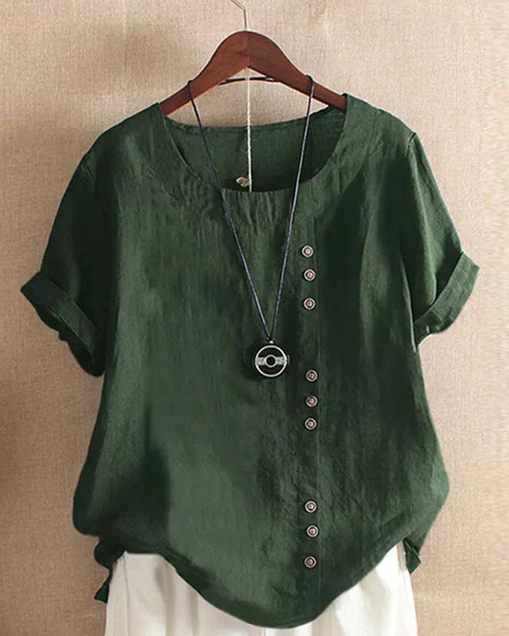 Blusa donna girocollo maniche corte risvoltate abbottonatura asimmetrica vestibilità ampia
