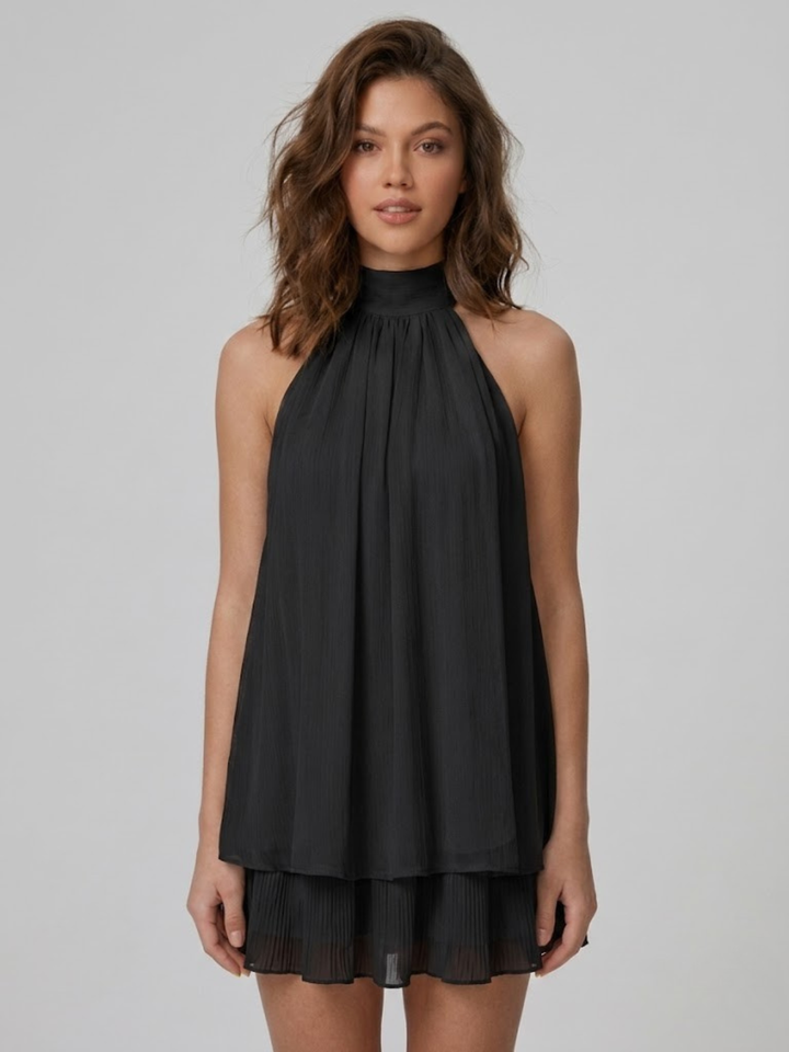 Vestito corto da donna con collo alto all'americana, schiena nuda e volant a balze