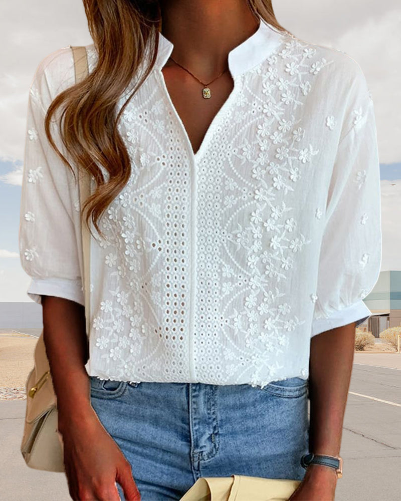 Blusa da donna bianca scollo a V maniche a sbuffo dettagli ricamati