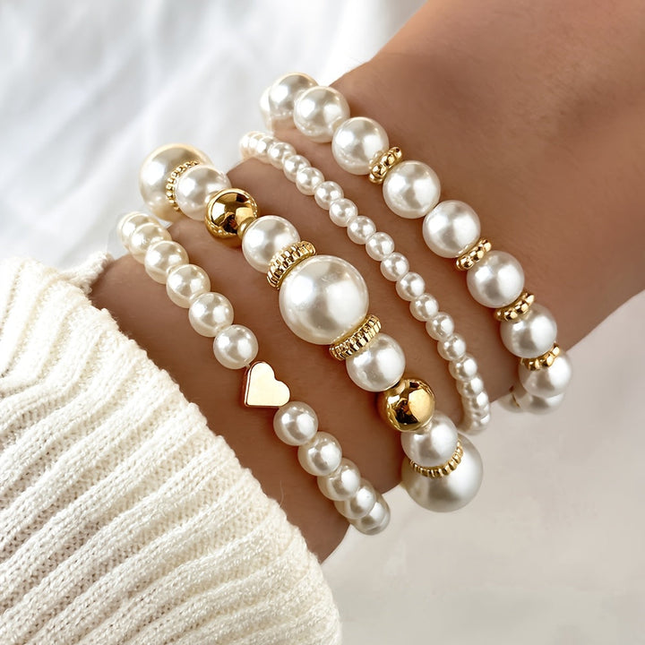 Set di bracciali eleganti a cuore con perle