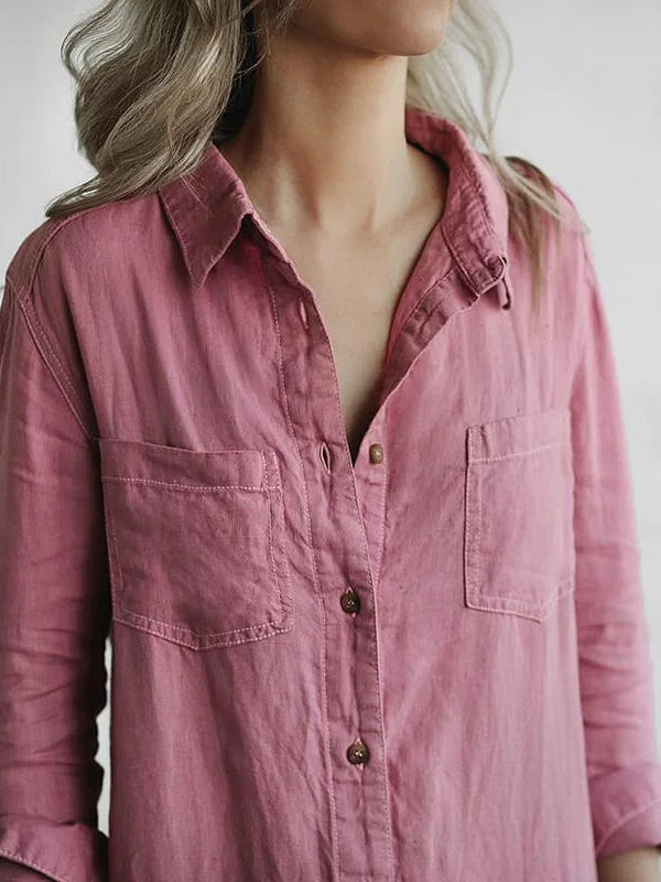 Tuta da donna con colletto a camicia abbottonato, maniche 3/4 e tasche sul Petto