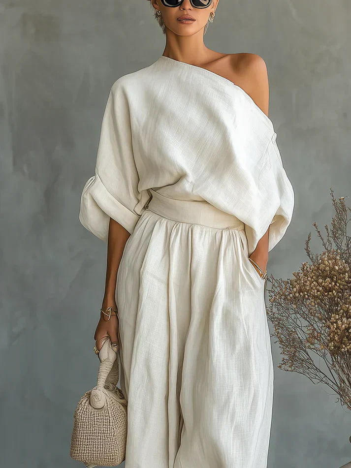 Completo donna écru scollo asimmetrico maniche a sbuffo pantalone sarouel