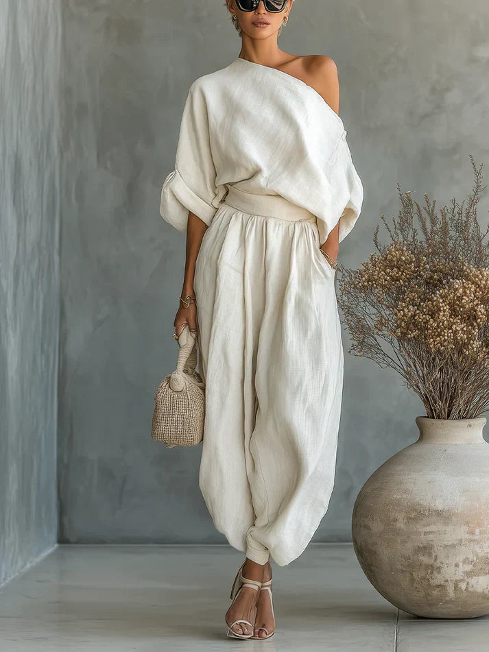 Completo donna écru scollo asimmetrico maniche a sbuffo pantalone sarouel