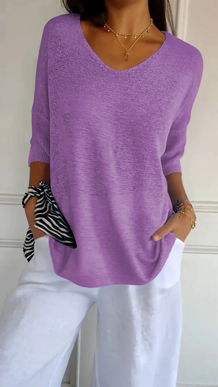 Blusa da donna con scollo a V, maniche 3/4, vestibilità morbida, orlo arrotondato