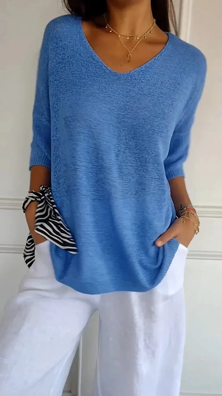 Blusa da donna con scollo a V, maniche 3/4, vestibilità morbida, orlo arrotondato