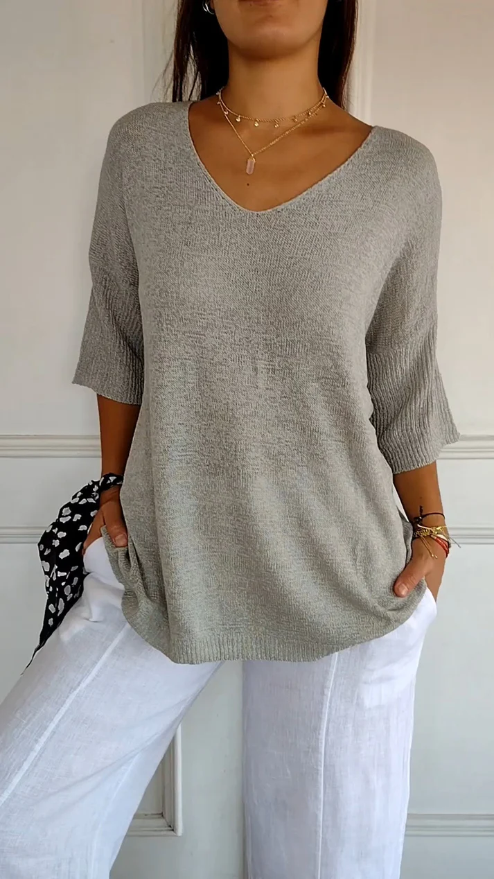 Blusa da donna con scollo a V, maniche 3/4, vestibilità morbida, orlo arrotondato