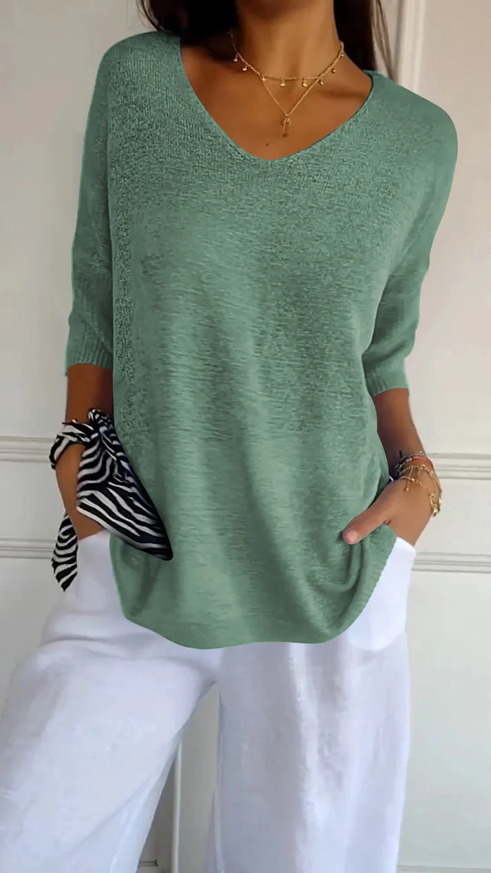 Blusa da donna con scollo a V, maniche 3/4, vestibilità morbida, orlo arrotondato