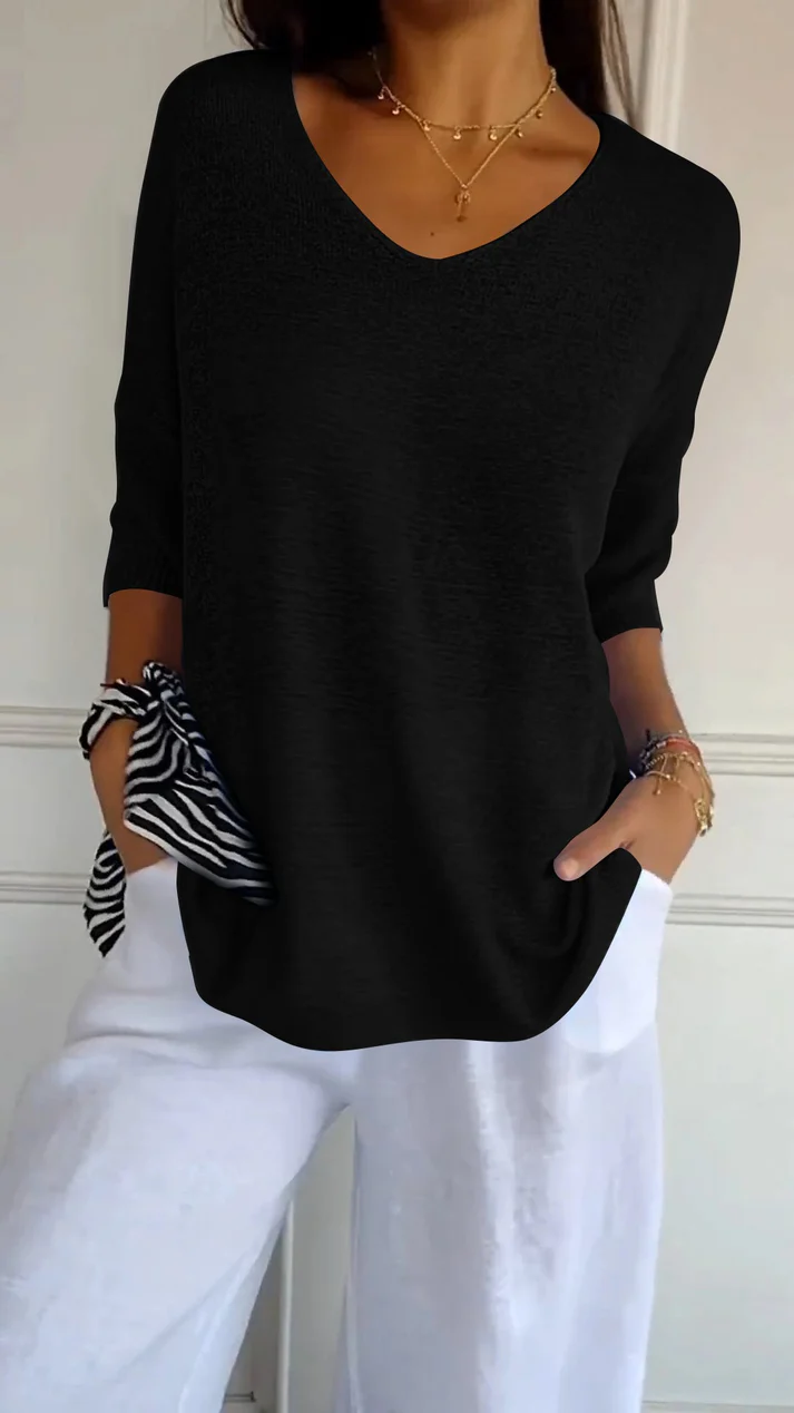 Blusa da donna con scollo a V, maniche 3/4, vestibilità morbida, orlo arrotondato