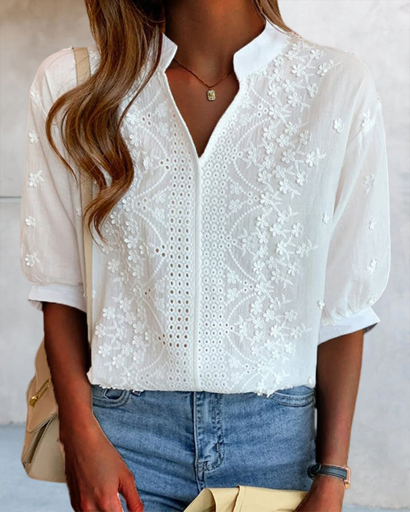Blusa da donna bianca scollo a V maniche a sbuffo dettagli ricamati