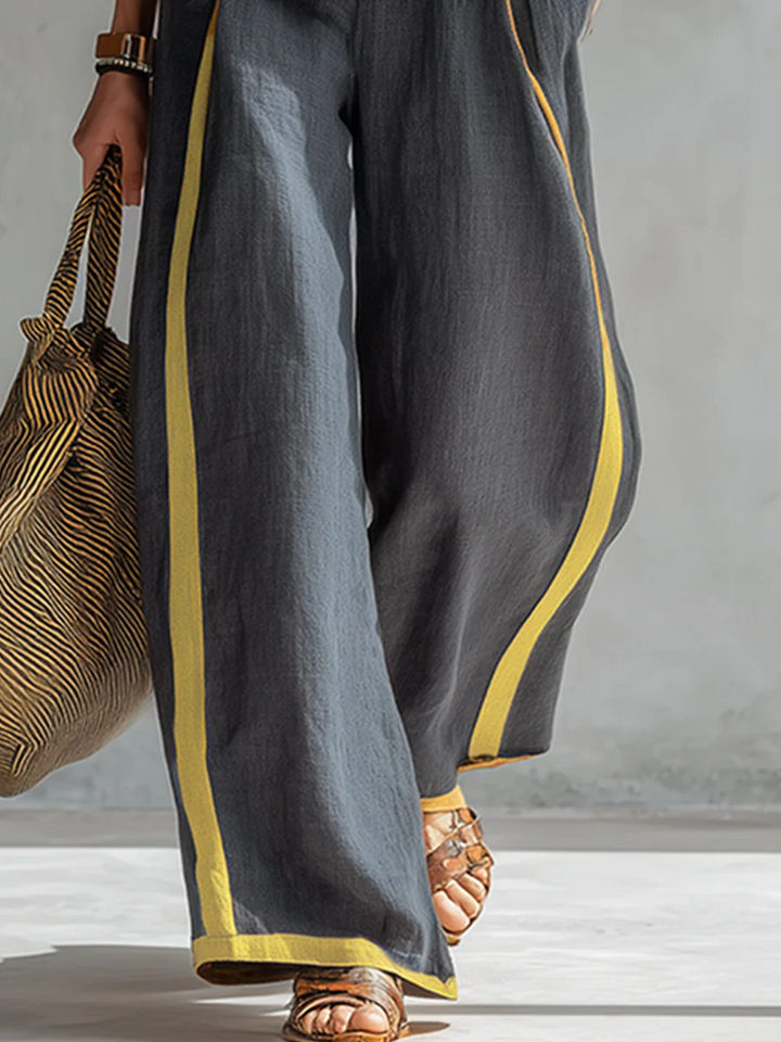 completo da donna con canotta senza maniche e pantaloni larghi multicolori