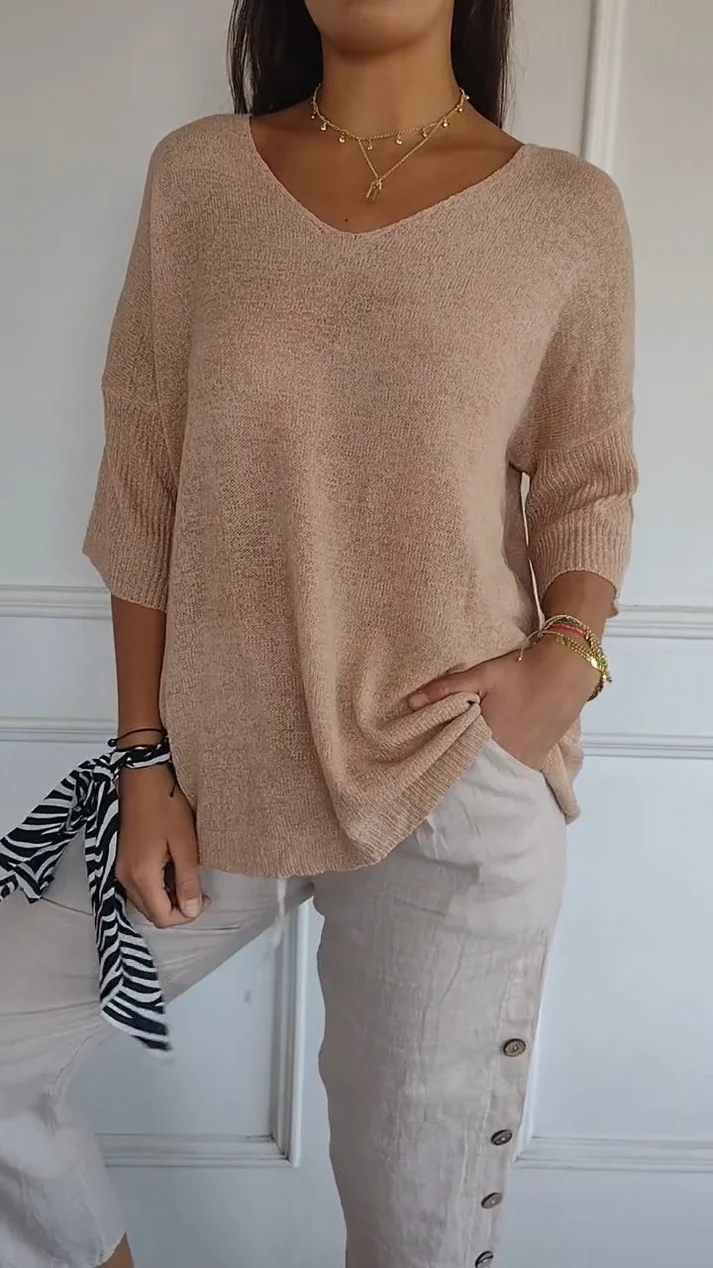 Blusa da donna con scollo a V, maniche 3/4, vestibilità morbida, orlo arrotondato