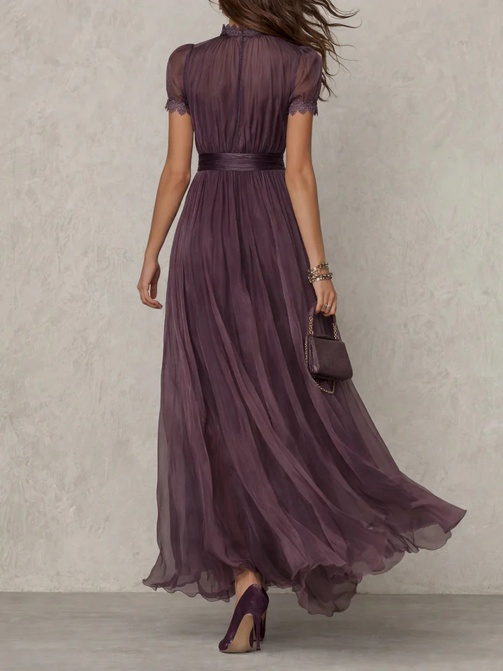 Vestito lungo da donna color prugna collo alto maniche a sbuffo plissettato