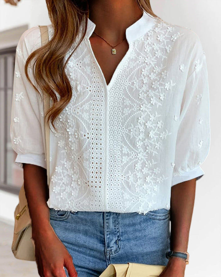 Blusa da donna bianca scollo a V maniche a sbuffo dettagli ricamati