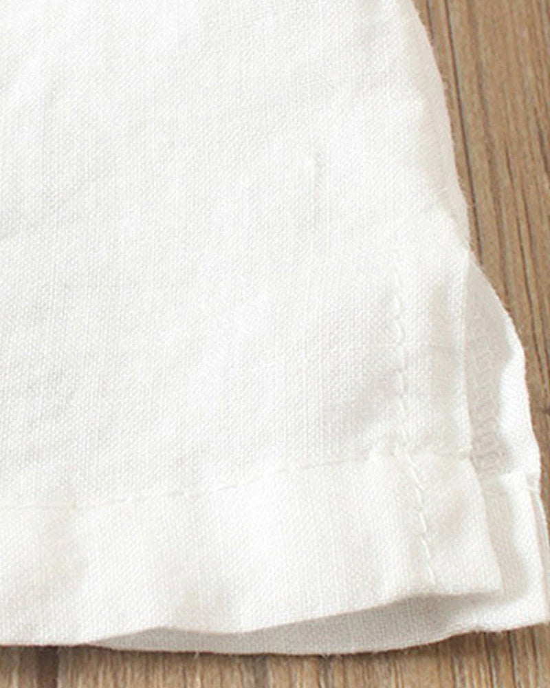 Blusa donna girocollo maniche corte risvoltate abbottonatura asimmetrica vestibilità ampia