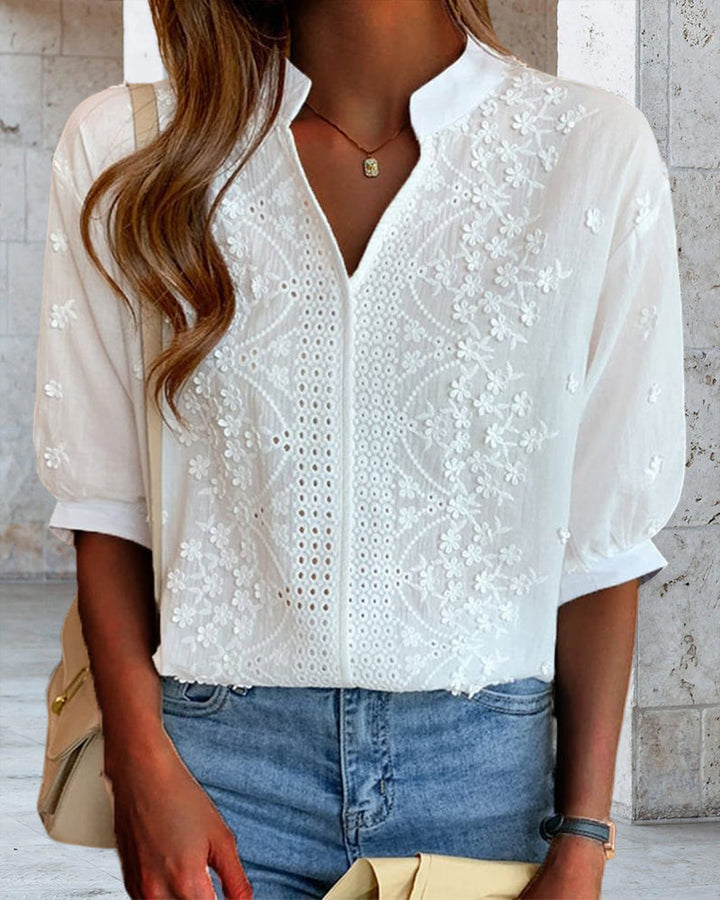 Blusa da donna bianca scollo a V maniche a sbuffo dettagli ricamati