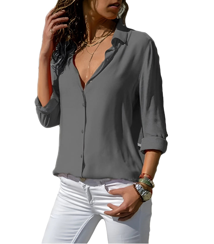 Blusa da donna con colletto classico, maniche 3/4, linea fluida e orlo arrotondato
