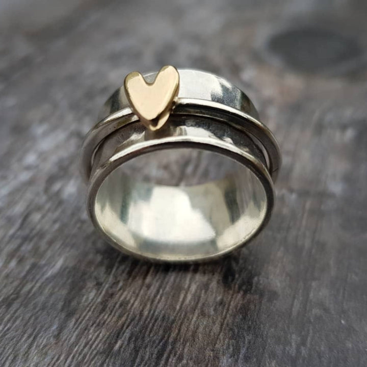 Anello in argento con cuore dorato