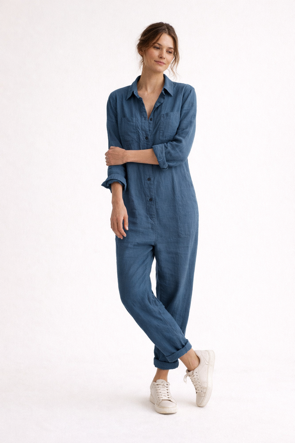 Tuta da donna con colletto a camicia abbottonato, maniche 3/4 e tasche sul Petto