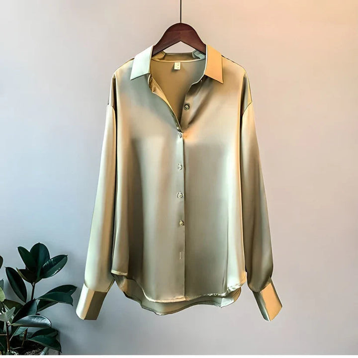 Blusa da donna maniche lunghe taglio fluido colletto classico orlo asimmetrico