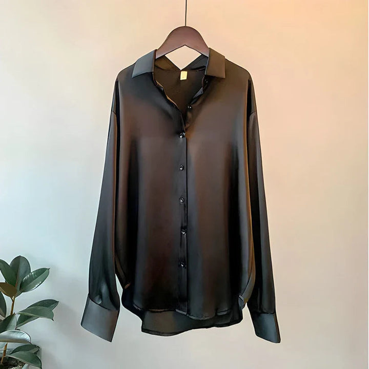 Blusa da donna maniche lunghe taglio fluido colletto classico orlo asimmetrico