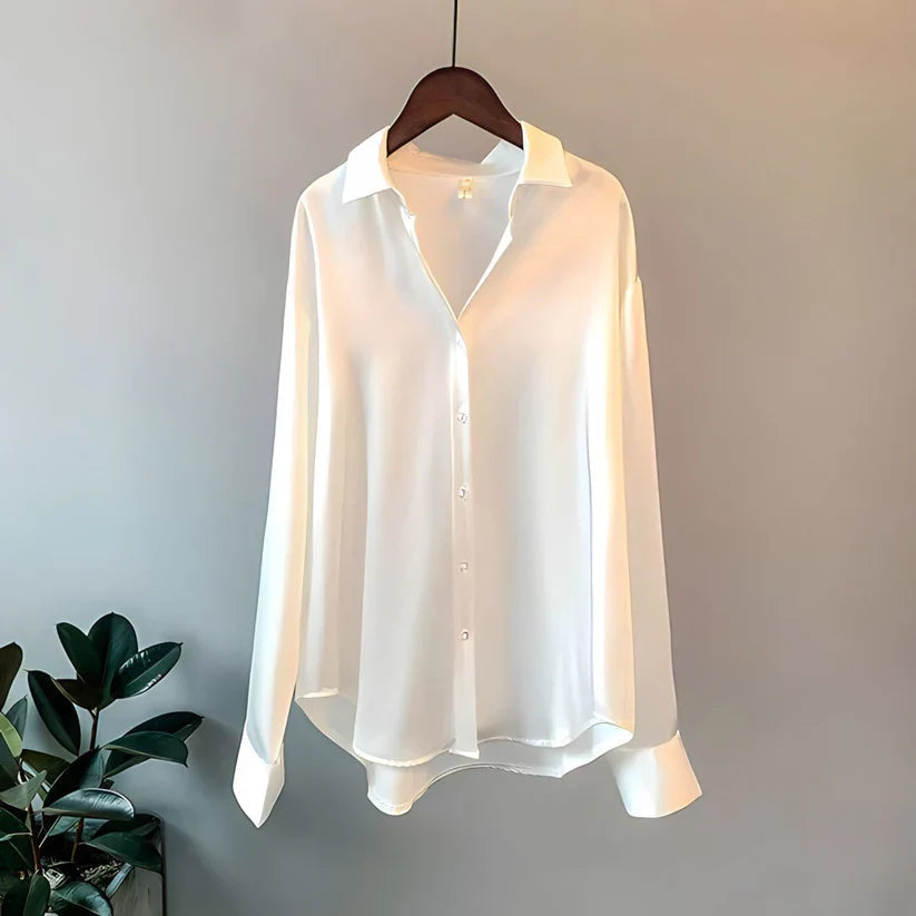 Blusa da donna maniche lunghe taglio fluido colletto classico orlo asimmetrico
