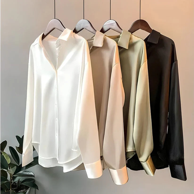 Blusa da donna maniche lunghe taglio fluido colletto classico orlo asimmetrico
