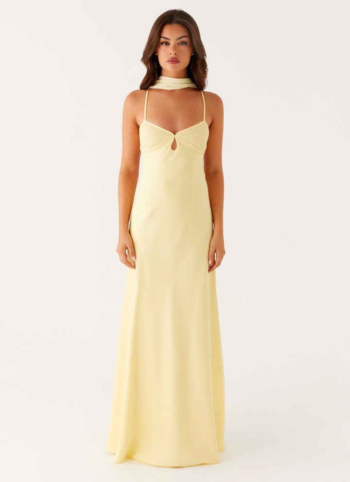 Vestito lungo donna giallo pallido, sottili spalline, cut-out sul busto, schiena annodata
