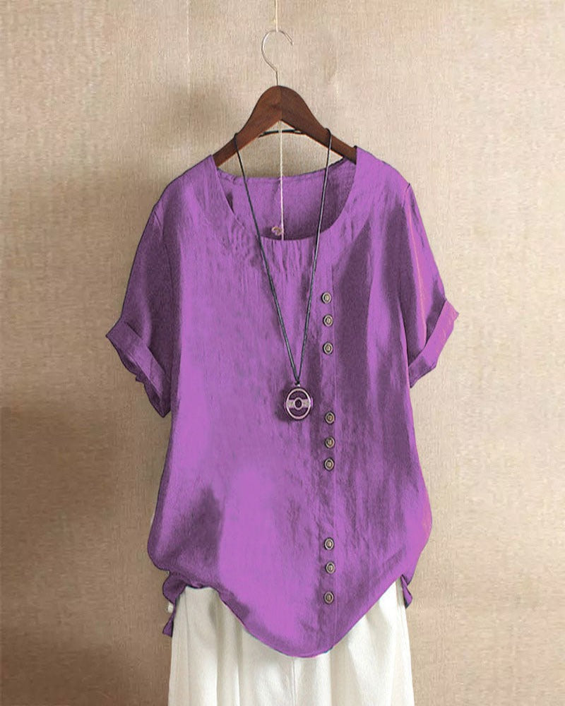 Blusa donna girocollo maniche corte risvoltate abbottonatura asimmetrica vestibilità ampia