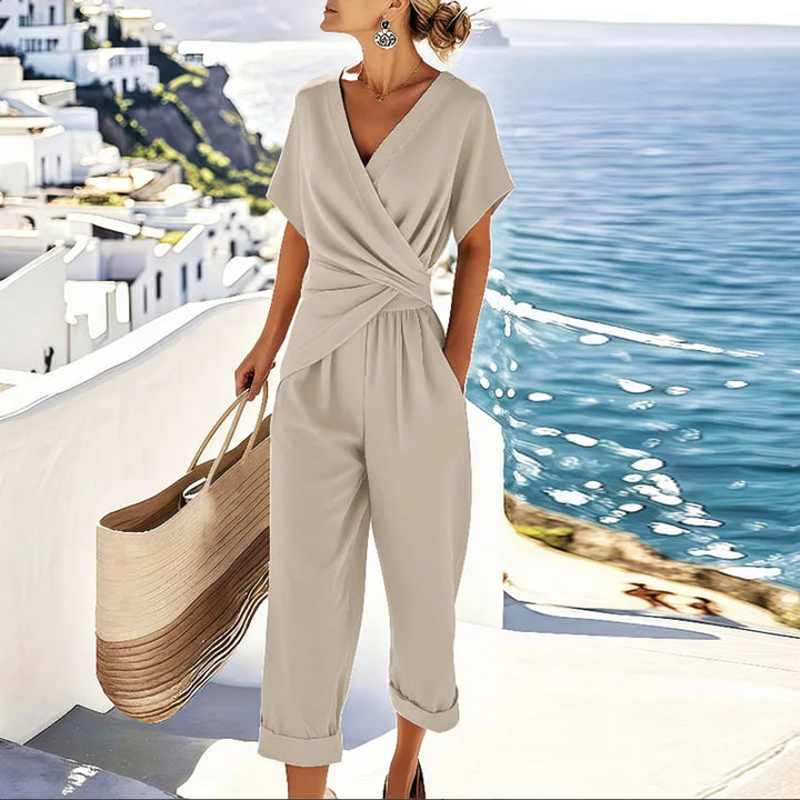 Tuta da donna scollo a V vita incrociata taglio ampio pantalone 7/8