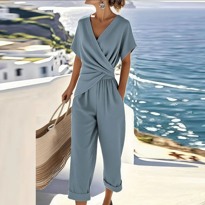 Tuta da donna scollo a V vita incrociata taglio ampio pantalone 7/8