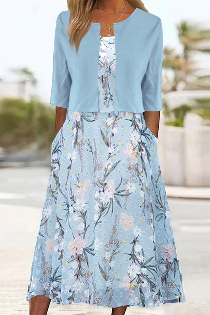 Abito midi da donna a stampa floreale svasato con gilet corto maniche 3/4