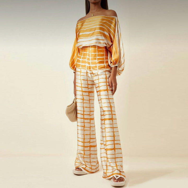 Completo da donna a taglio fluido con stampa ondulata multicolore pantaloni ampi