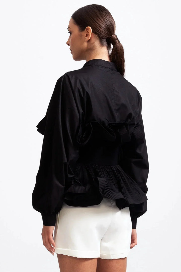 Blusa da donna con volant e maniche voluminose