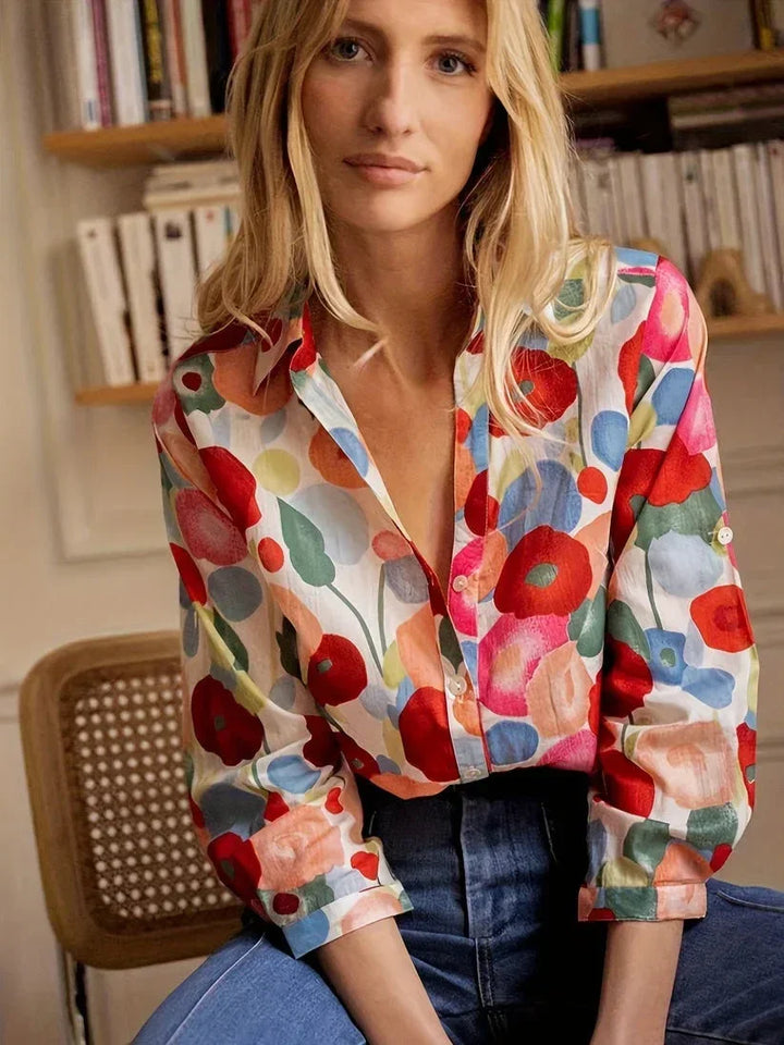 Blusa da donna colorata a motivi floreali con maniche lunghe
