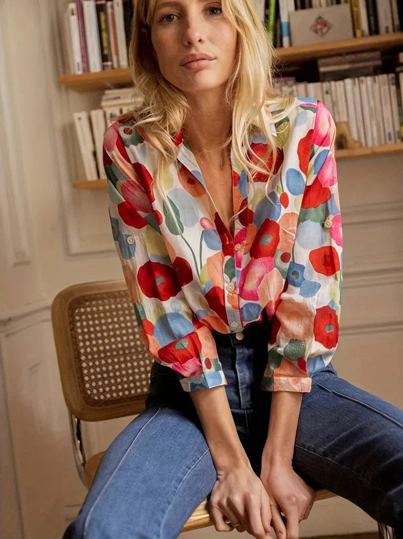Blusa da donna colorata a motivi floreali con maniche lunghe