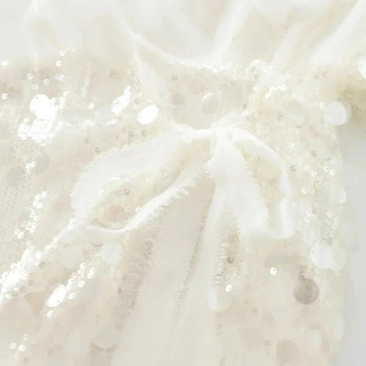 Blusa donna avorio con paillettes e scollo a V