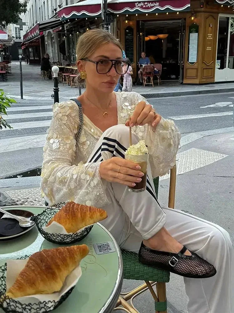 Blusa donna avorio con paillettes e scollo a V