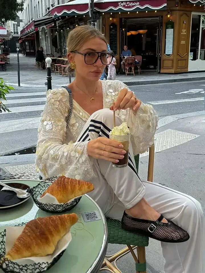 Blusa donna avorio con paillettes e scollo a V