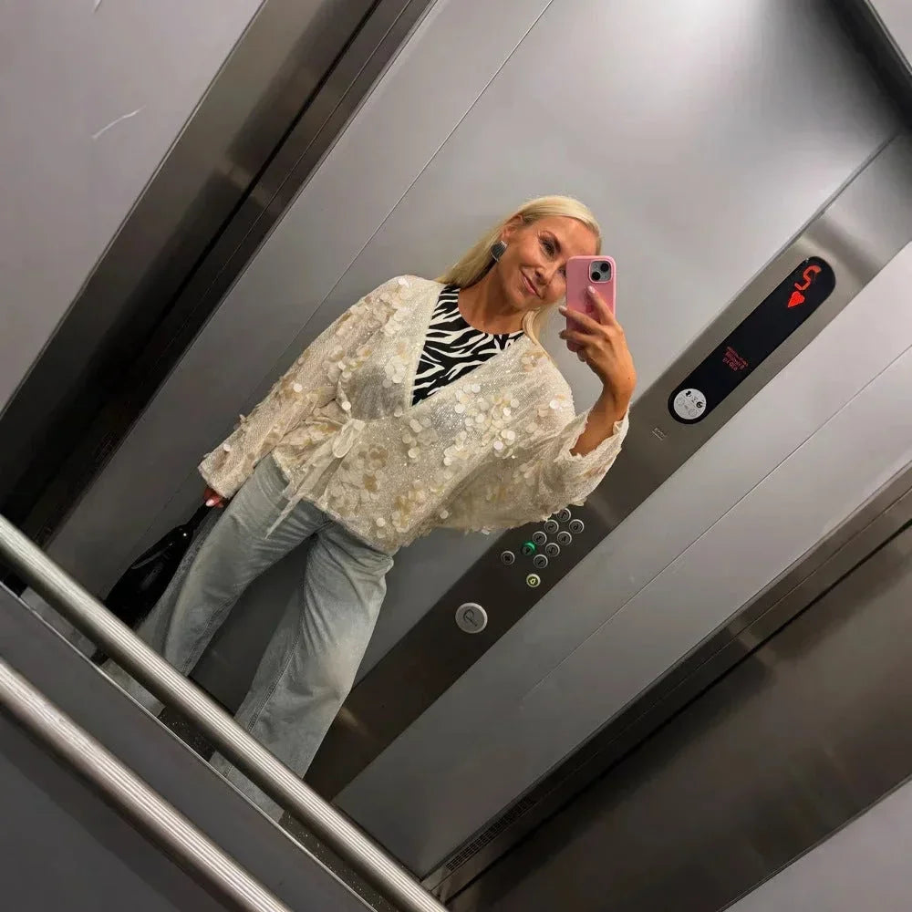 Blusa donna avorio con paillettes e scollo a V