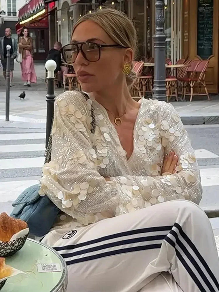 Blusa donna avorio con paillettes e scollo a V