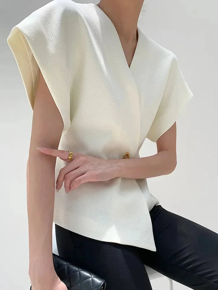 Blusa donna stile incrociato con maniche scolpite