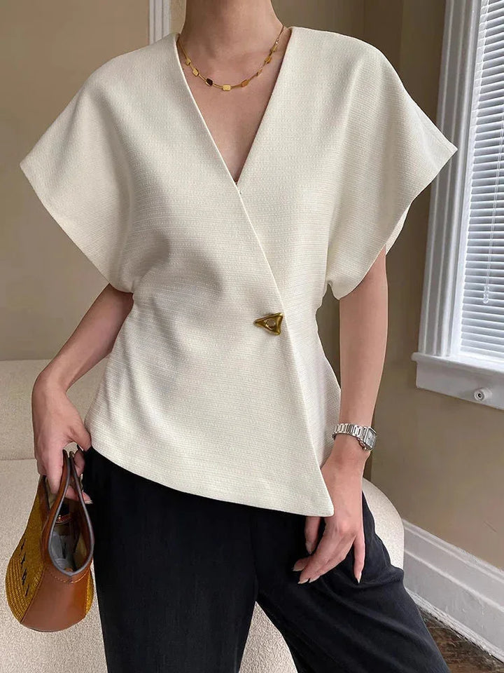Blusa donna stile incrociato con maniche scolpite