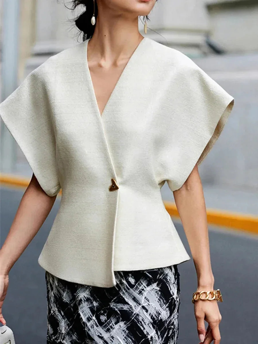 Blusa donna stile incrociato con maniche scolpite