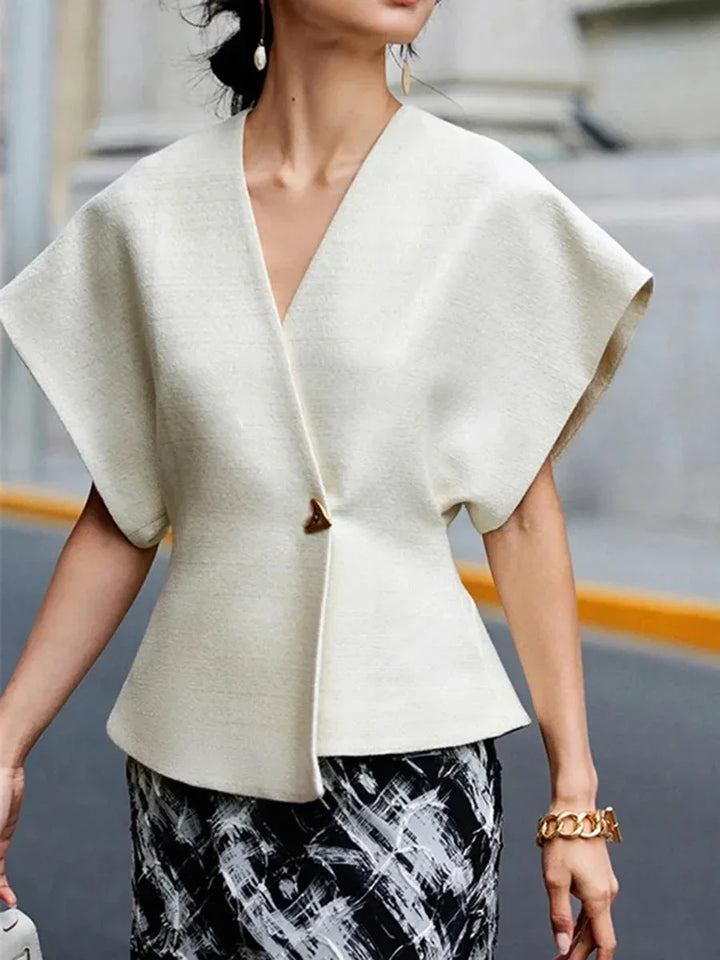 Blusa donna stile incrociato con maniche scolpite