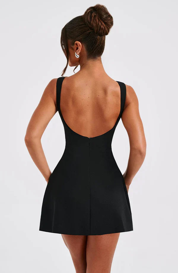 Vestito corto da donna con scollo a barca, schiena scoperta, gonna svasata, senza maniche, con tasche
