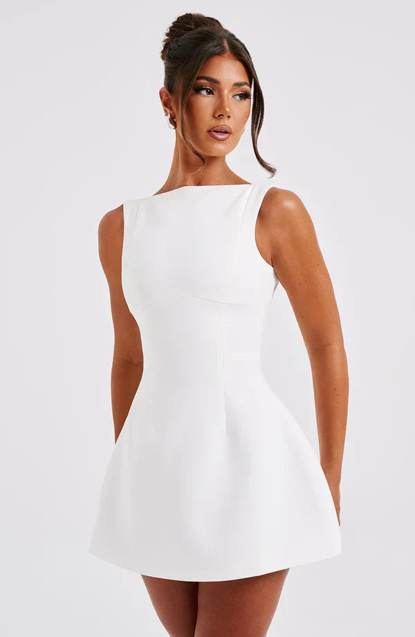Vestito corto da donna con scollo a barca, schiena scoperta, gonna svasata, senza maniche, con tasche