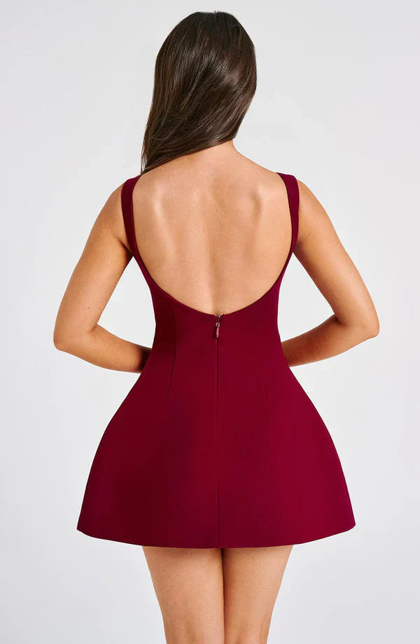 Vestito corto da donna con scollo a barca, schiena scoperta, gonna svasata, senza maniche, con tasche